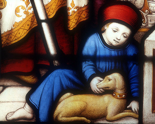 Boy with dog, detail from nineteenth century St Paul window, north choir aisle, Lichfield Cathedral, Staffordshire, England