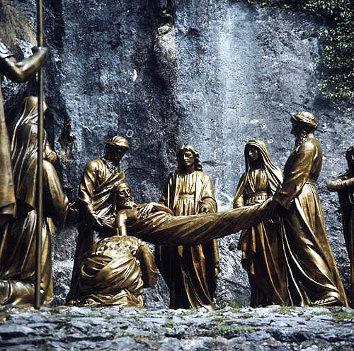 France, Lourdes, Calvary Station 14 Joseph of Arimathea laying Christ in his Sepulchre