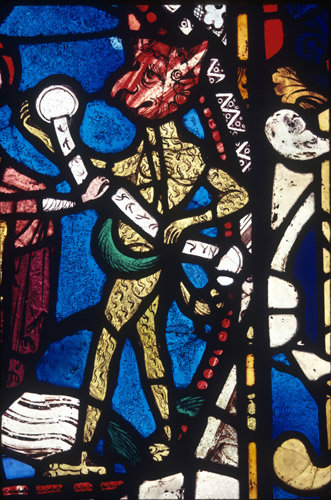 Detail of Satan surrendering the bond to the Virgin 13th century stained glass, east window Lincoln Cathedral, Lincoln, England