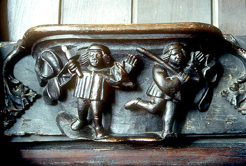 Misericord of the month of April, fifteenth century, bird scaring, Church of St Mary, Ripple, Worcestershire