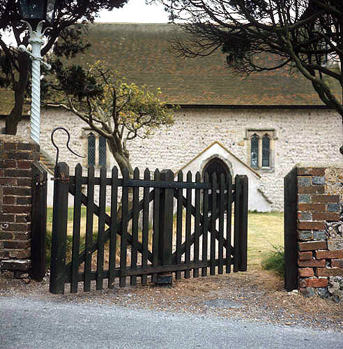 Tapsel gate, rare form of lych gate, with central pivot and hook of shepherd