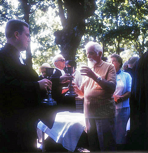 Prostestant Communion, Priest passing the Chalice, France