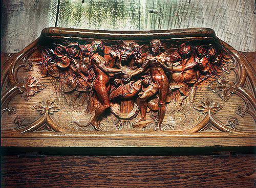Misericord in Gloucester Cathedral, temptation of Adam and Eve
