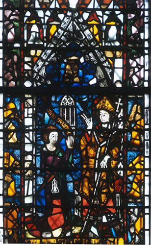 York Minster the Bell Founders window middle panel showing the bell being presented to St William 14th century stained glass