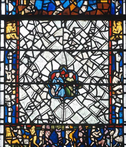 York Minster detail of the Monkeys Funeral 14th century stained glass