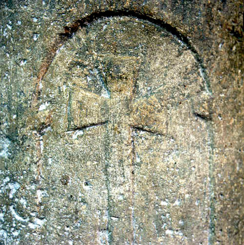 One of eight carved crosses on Saxon font in St Mary the Virgin