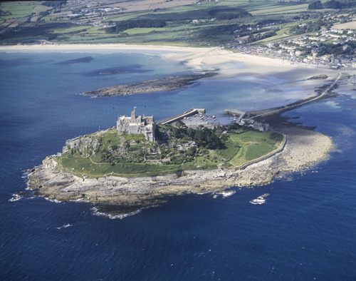 St Michaels Mount at low tide showing causeway to Marazion, aerial view, Cornwall, England, Great Britain