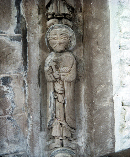 Figure carved on west jamb of south doorway, twelfth century, Church of SS Mary and David, Kilpeck, Herefordshire, England