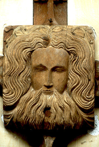 Green Man boss, 16th century, carved in wood,  on ceiling, Church of St Andrew, Sampford Courtenay, Devon, England