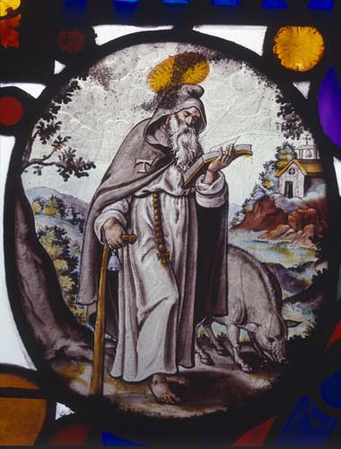St Anthony, with tau cross on his cloak,17th century Netherlandish stained glass roundel, Church of St Peter, Nowton, Suffolk, England, Great Britain