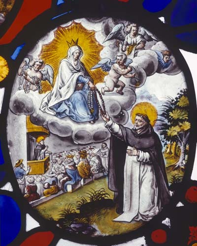 St Dominic, founder of Order of the Rosary, being handed rosary by Virgin Mary, 17th century Swiss stained glass roundel, Church of St Peter, Nowton, Suffolk, England, Great Britain