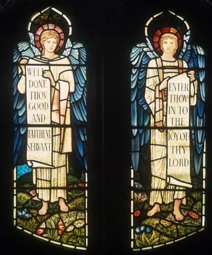 Two angels with scrolls, south aisle, West window by Burne-Jones, 1898,  St Martin