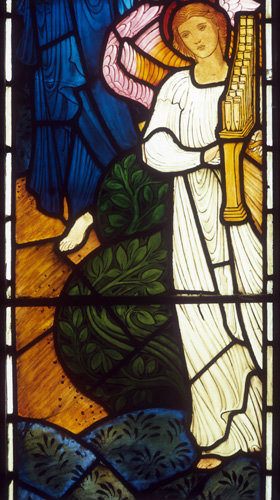 Angel in white with a portable organ, angels of Paradise window, by Edward Burne-Jones, 1881, All Hallows Church, Allerton, Liverpool, Lancashire, England