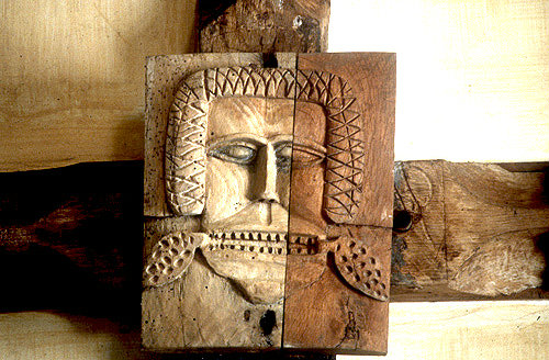 Green Man boss, 16th century, carved  in wood on chancel ceiling, Church of St Andrew, Sampford Courtenay, Devon, England