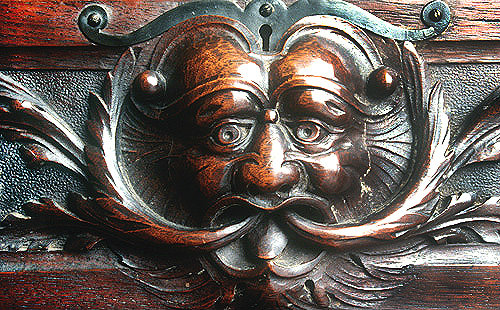 Green Man, carving on drawer of tallboy secretaire by W.S.Williamson, circa 1903, private property
