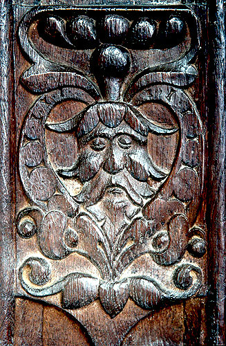 Green Man, carved in wood on bench end, Church of St Mary the Virgin, Down St Mary, Devon, England