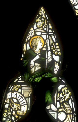 Faith, one of three theological virtues, by Powell, nineteenth century, tracery of window 3, south nave aisle, Exeter Cathedral, England