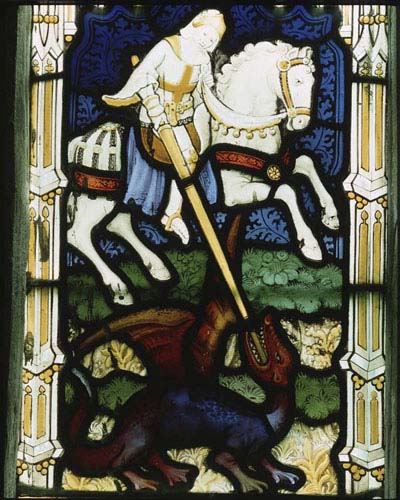 St George and the  Dragon, stained glass window 1918 by H Bryans, designed by Ernest Heaseman, Church of St Mary, Newton Valence,  Hampshire, England, Great Britain