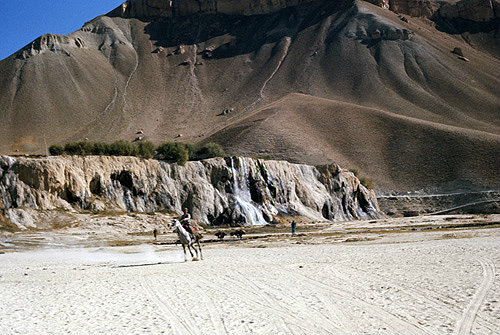 Afghanistan, Hindu Kush at Band-I-Amir, travellers on horseback in valley pass