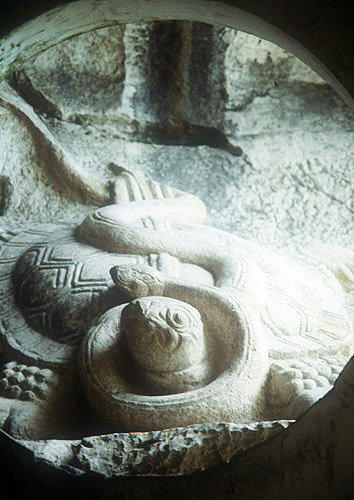 Snake carving outside Seven-Star Cave, extensive limestone cave complex, Kweilin (Guilin), China
