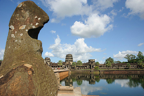 Entrance causeway over moat on west side and lion, Angkor Wat, built 1113-15 AD by Suryavarman II, Hindu (Vishnu), Cambodia
