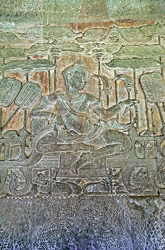 Carved relief of founder, Suryavarman II, enthroned, Angkor Wat temple built 1113-52 AD, Hindu (Vishnu) Cambodia