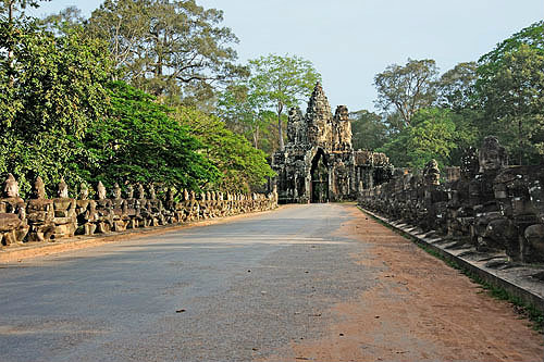 Causeway over moat leading to south gate, Angkor Thom, completed late twelfth century by King Jayavarman VII, Cambodia