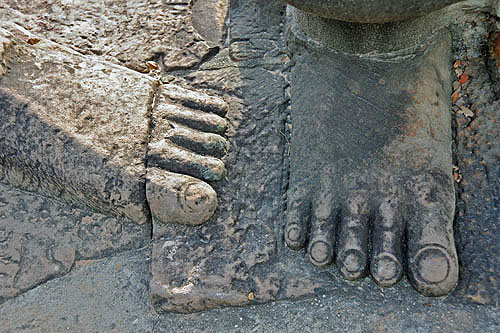 Feet of one of demons on causeway, Angkor Thom, completed late twelfth century by King Jayavarman VII, Cambodia