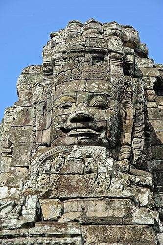 Carved face on gopura on east side, Bayon temple, Angkor Thom, completed late twelfth century by Jayavarman VII, Cambodia