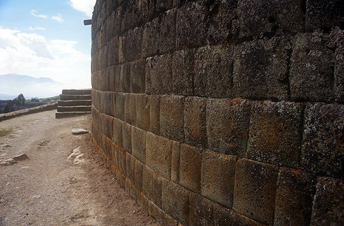 Section of eliptical wall of Inca temple complex at Ingapirca showing cushion-shape of each stone, Ingapirca, Ecuador