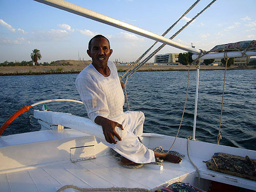 Nubian sailing felucca on Nile, Aswan, Egypt