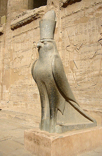 Colossal granite sculpture of the falcon god Horus, 3C BC Ptolomeic temple of Horus, Edfu, Egypt