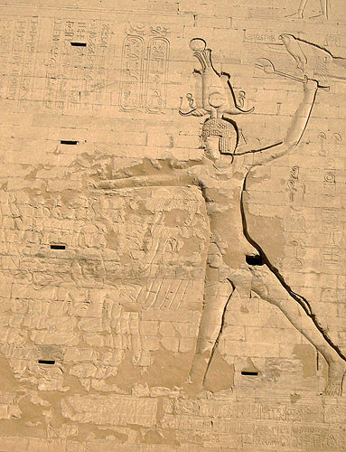 Ptolemy XII presenting defeated enemies to Horus, temple of Horus, Edfu, Egypt