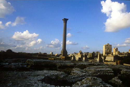 Egypt Alexandria Sphinx and Pompeys Pillar behind the Serapis temple