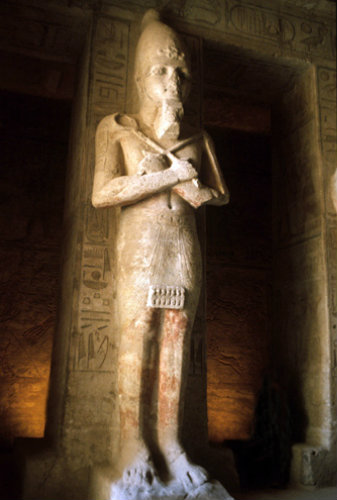 Egypt,  Abu Simbel, one of the eight Osiride colossi sculpted against pillars inside the main temple