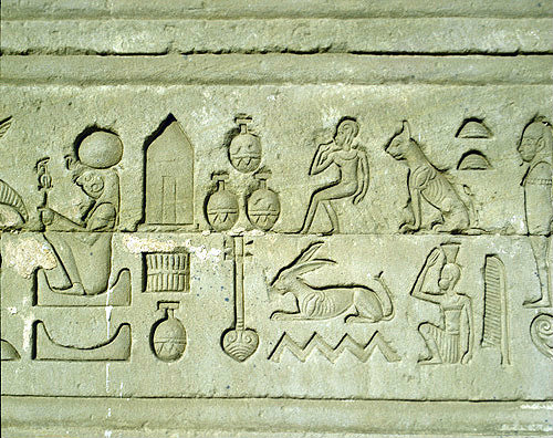Hieroglyphs, sunk relief on the eastern facade of Temple of Hathor, Dandara, Egypt