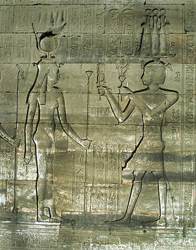 Egypt Dendera relief on the eastern facade of the Temple of Hathor showing the Goddess receiving gifts