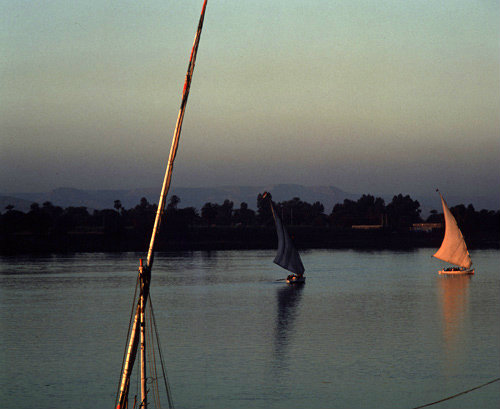 Egypt feluccas on the Nile in the setting sun