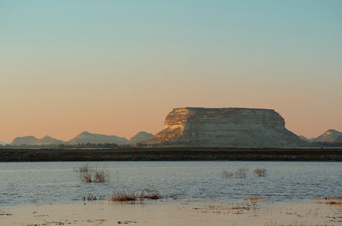 Egypt, Siwa, Birket Siwa (salt lake) view North West from Fatnis Island at sunset