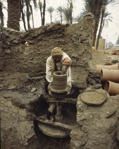 Potter at wheel, village south of Cairo, Egypt
