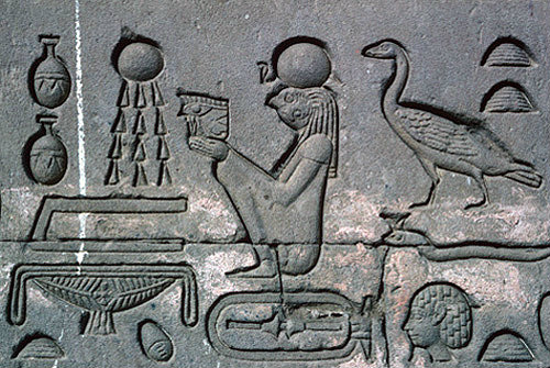 Sun God Ra, centre, sunk relief on south wall of Temple of Hathor, Dandara, Egypt