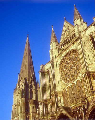 South spire and rose window, twelfth century, at sunrise, Chartres Cathedral, France