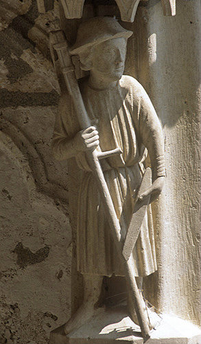 Chartres Cathedral, north porch, right bay, first archivolt, June, man with scythe, 13th century