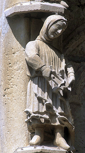 Chartres Cathedral, north porch, right bay, first archivolt, March, pruning vines, 13th century
