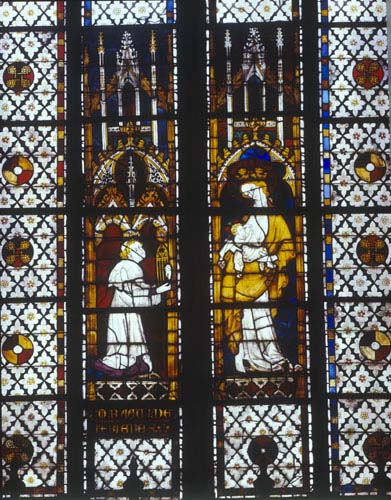 Canon Raoul de Ferrieres offers his gift to the Virgin, 14th century stained glass, Evreux Cathedral, France