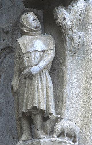 Chartres Cathedral, north porch, right bay, first archivolt, November, feeding pig 13th century