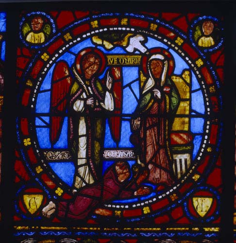 Annunciation and Abbe Suger, 12th century stained glass, Church of St Denis, Paris, France 