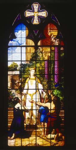 St Adelaide and the poor, 19th century stained glass, Chapelle Royale, Dreux, France 