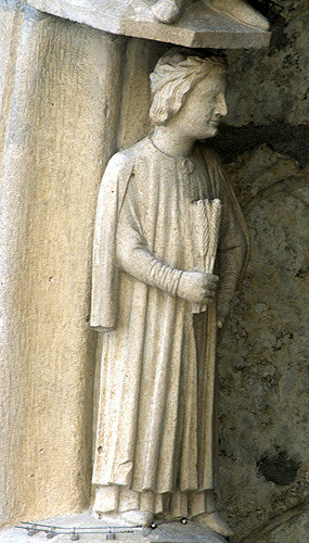 Chartres Cathedral, north porch, right bay, first archivolt, April, man with corn, 13th century