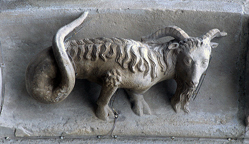 Chartres Cathedral, north porch, right bay, outer archivolt, sign of Zodiac, Capricorn